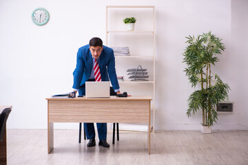 Young businessman employee working in the office