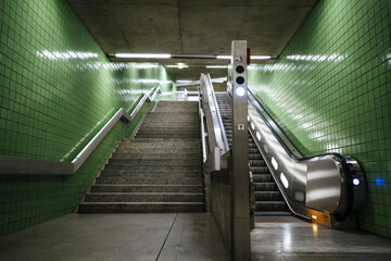 View inside an empty escalator and staircase in a subway station in Germany