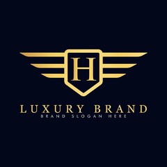 Alphabet capital logo creative design luxury concept with wings ornament silhouette