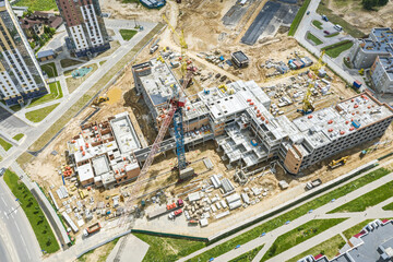 construction of new building in a residential area. aerial view of large construction site.
