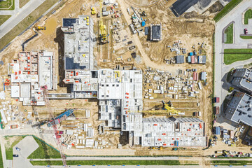 new construction site with cranes and building materials. aerial photo, top view