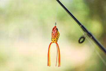 Fishing lure or Fishing bait on Fishing rod with nature background