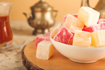 Bowl with Turkish delight on table, closeup