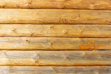 Fototapeta premium wooden background texture of wall of log rural house with copy space for your design.