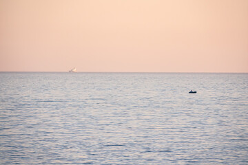 Beautiful pink sunset over the sea. Sochi, Russia