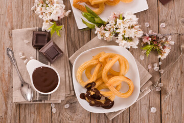 Churros with chocolate dipping sauce.