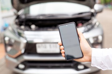 Smart phone helps call a mechanic to fix the broken car.