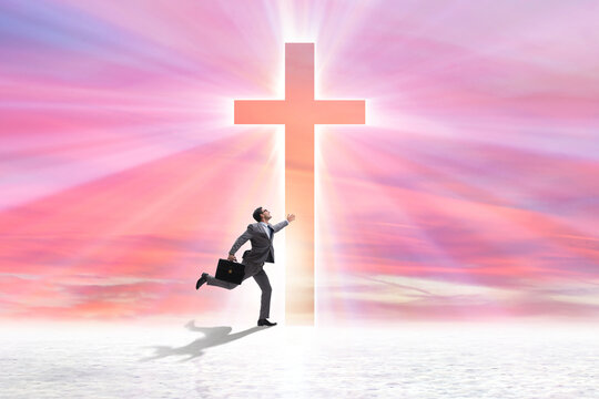 Religious concept with cross and lonely man