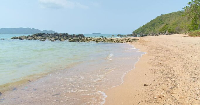 beautiful nature Sunny tropical sor beach turquoise sea background in summer day with wave crashing on sandy shore, Sattahip, Thailand, enjoy vacation holiday weekend