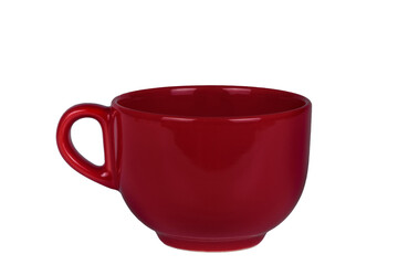 Red mug for tea with a handle on a white background.