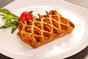 Sweet puff pastry served strawberry