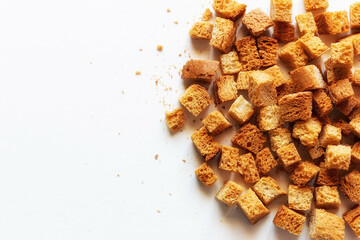 white bread croutons on a light background with place for text