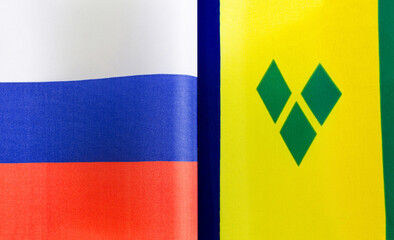 fragments of the national flags of Russia and Saint Vincent and the Grenadines close-up
