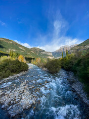 Fototapeta na wymiar the Ara river as it passes through the town of Torla, in the Aragonese Pyrenees, located in Huesca, Spain