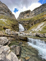 views of mountains, forests, waterfalls and natural pools in the Ordesa y Monte Perdido National Park, located in the Aragonese Pyrenees. in the province of Huesca, Spain