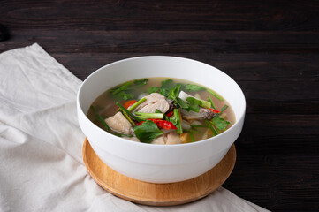 Thai Spicy chicken clear soup , tom yum kai,