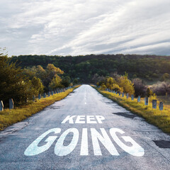 Keep going. Words on the road. Motivation concept.