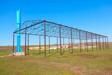 Metal structure of the greenhouse . Old abandoned farm