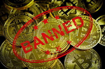 pile of Bitcoin and red banned sign