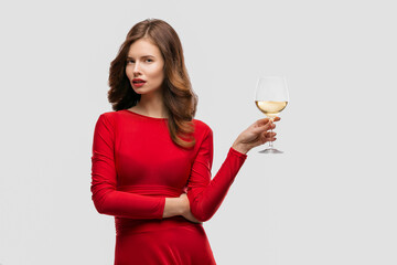 Beautiful woman holding glass of wine onwhite background