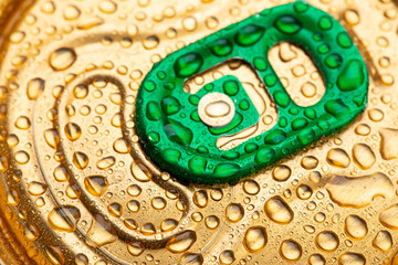 Cold metal beer can with water drops. Alcoholic drink. Canned drinks.