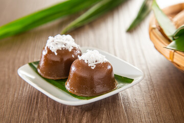 Kuih kosui, traditional Malaysian Nyonya sweet dessert cake. It is best eaten with freshly grated coconut.