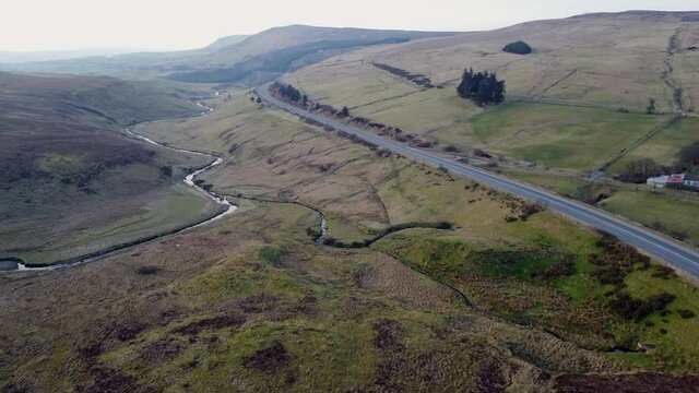 Aerial Video of the Glenshane pass and road going over the Spirren mountains in Northern Ireland