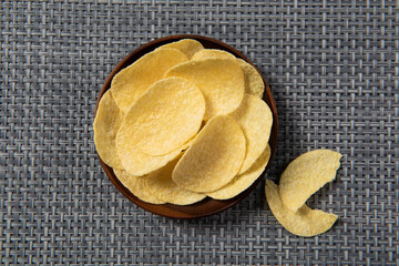 Group of potato chips in plate with clipping path