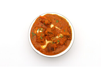 Indian food in brass bowl