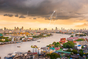 Fototapeta premium BANGKOK THAILAND -07 June 2007: Bangkok Morning sunrise over the Grand Palace in Thailand is the Chao Phraya River with boats in Thailand,