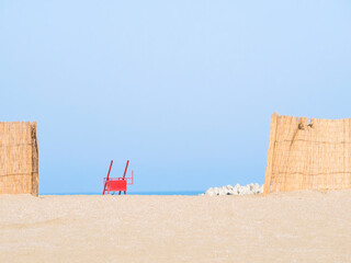 Summer landscape with a straw fence on the Modern beach in Constanta Romania