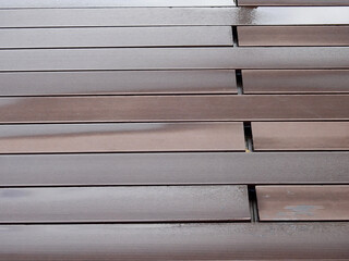 Fototapeta premium wet artificial wood flooring after rain