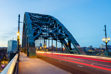 Newcastle upon Tyne UK: 16th March 2021: Tyne Bridge long exposure with blurred traffic during rush hour and blue hour