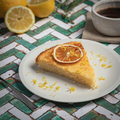 Lemon cake with a cup of black coffee.