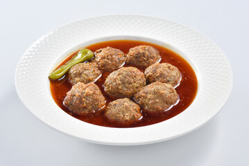 Kofta Curry, Delicious and spicy meat balls cooked in spicy thick gravy. Famous cuisine of Pakistan and India