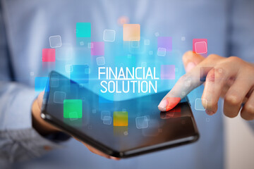 Young man holding a foldable smartphone