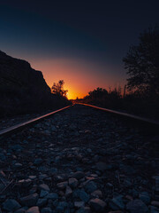 Dawn over a railway track. The golden hour.
