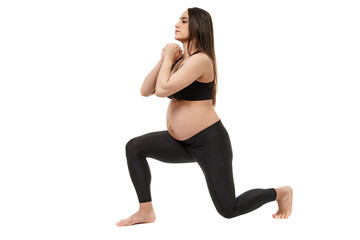 Fototapeta na wymiar Pregnant woman doing fitness exercises