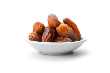 Piles of dates isolated on white