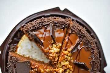 Delicious chocolate cake with nuts and butter