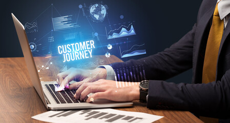 Businessman working on laptop, business concept