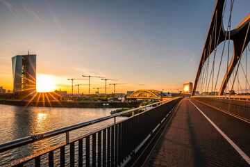 

Frankfurt am Main, the city its skyline with a view over the Main in the sunset. skyscrapers a river and a great sky