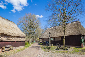 Fototapeta na wymiar Crossing of cobblestoned streets in Orvelte, Netherlands