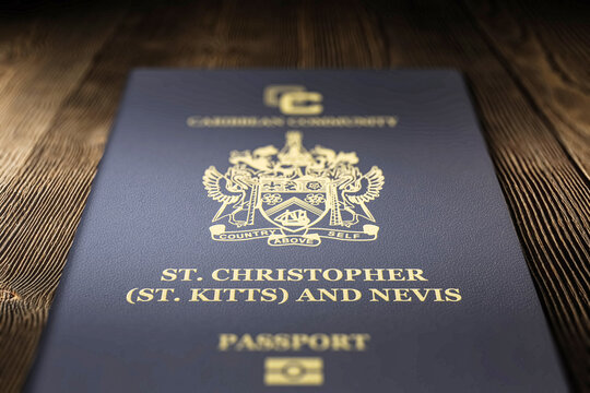 Close-up of saint kitts and nevis passport on a dark wooden board, citizenship by Investment