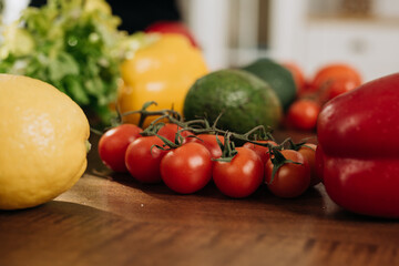 Close-up of fresh vegetables on the kitchen table. Vegetarian food concept