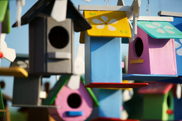 colorful wooden bird houses