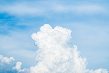 Blue sky with beautiful natural white clouds. Space for text. Background.