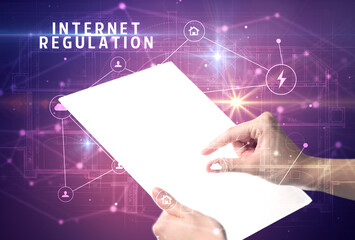 Holding futuristic tablet, security concept