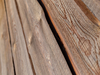 Old raw textured wood boards. Selective focus.