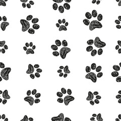 Fototapeta na wymiar Black doodle paw print seamless for fabric design pattern background